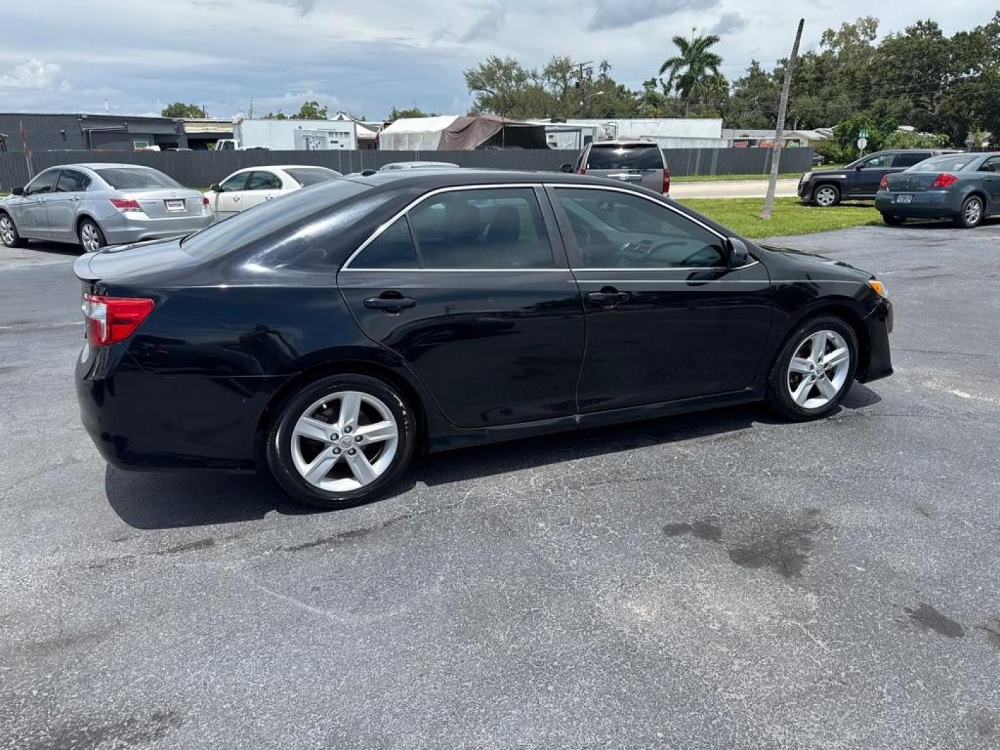 2014 BLACK TOYOTA CAMRY SE (4T1BF1FKXEU) with an 2.5L engine, Automatic transmission, located at 2929 9th St. West, Bradenton, 34205, (941) 242-2810, 27.473591, -82.570679 - Thanks for inquring into DriveNation USA! All vehicles listed can be viewed at www.drivenationusa.com for vehicle history reports and additonal info. We cannot quote any terms such as down payments or monthly payments without an application. You can apply directly at www.drivenationusa.com or by con - Photo#8