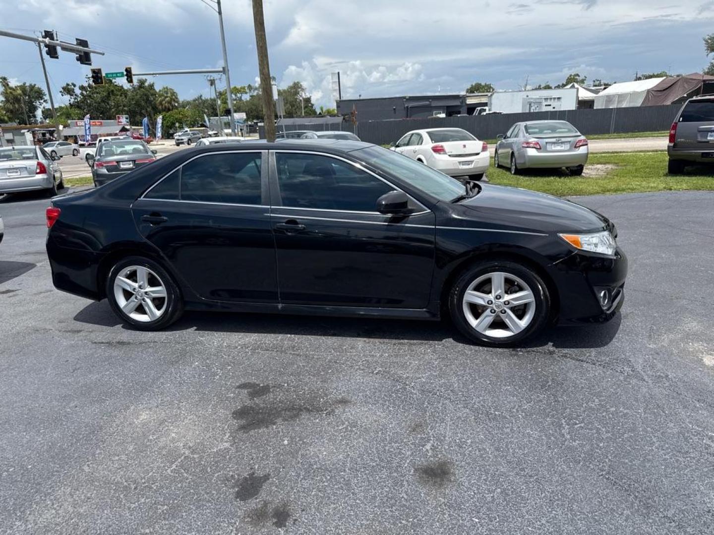 2014 BLACK TOYOTA CAMRY SE (4T1BF1FKXEU) with an 2.5L engine, Automatic transmission, located at 2929 9th St. West, Bradenton, 34205, (941) 242-2810, 27.473591, -82.570679 - Thanks for inquring into DriveNation USA! All vehicles listed can be viewed at www.drivenationusa.com for vehicle history reports and additonal info. We cannot quote any terms such as down payments or monthly payments without an application. You can apply directly at www.drivenationusa.com or by con - Photo#9