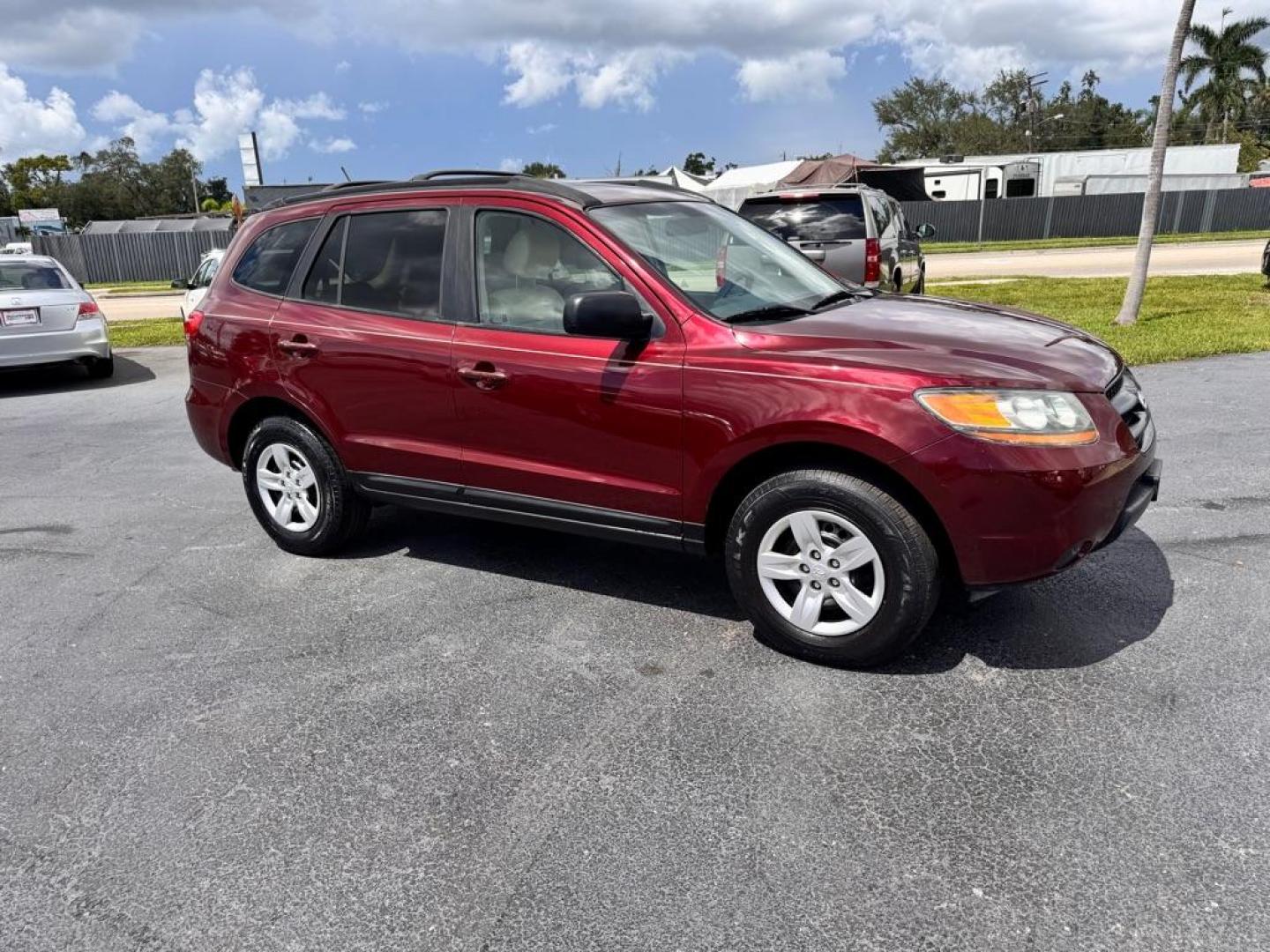 2009 RED HYUNDAI SANTA FE GLS (5NMSG13D39H) with an 2.7L engine, Automatic transmission, located at 2929 9th St. West, Bradenton, 34205, (941) 242-2810, 27.473591, -82.570679 - Thanks for inquring into DriveNation USA! All vehicles listed can be viewed at www.drivenationusa.com for vehicle history reports and additonal info. We cannot quote any terms such as down payments or monthly payments without an application. You can apply directly at www.drivenationusa.com or by con - Photo#0