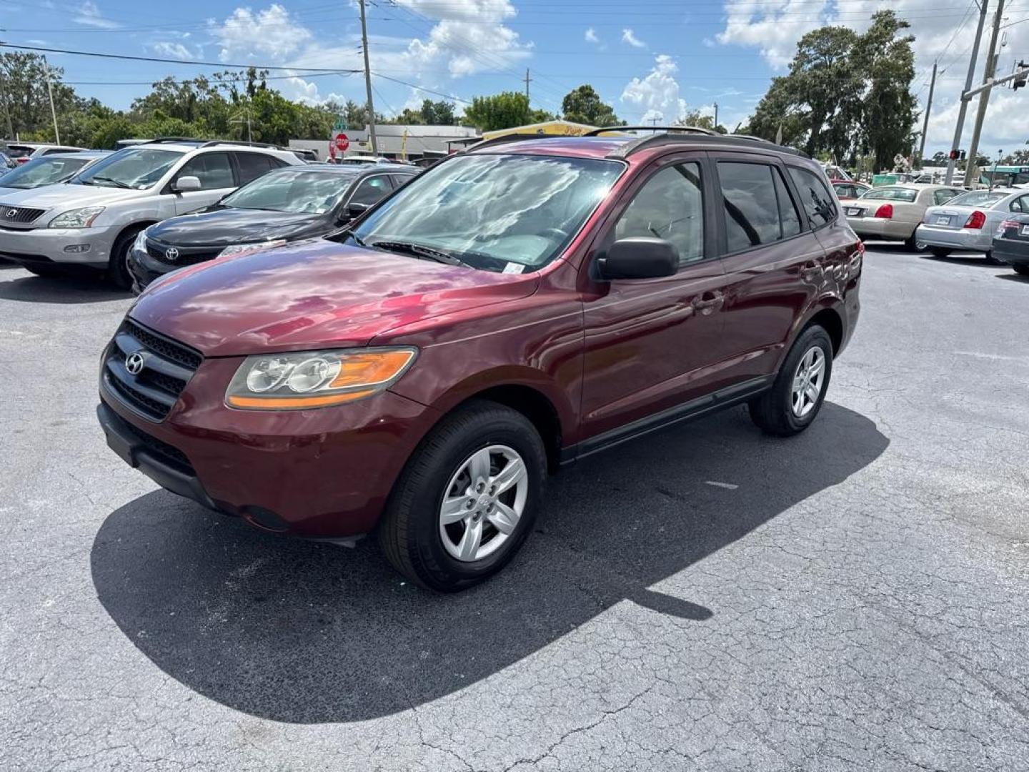 2009 RED HYUNDAI SANTA FE GLS (5NMSG13D39H) with an 2.7L engine, Automatic transmission, located at 2929 9th St. West, Bradenton, 34205, (941) 242-2810, 27.473591, -82.570679 - Thanks for inquring into DriveNation USA! All vehicles listed can be viewed at www.drivenationusa.com for vehicle history reports and additonal info. We cannot quote any terms such as down payments or monthly payments without an application. You can apply directly at www.drivenationusa.com or by con - Photo#4