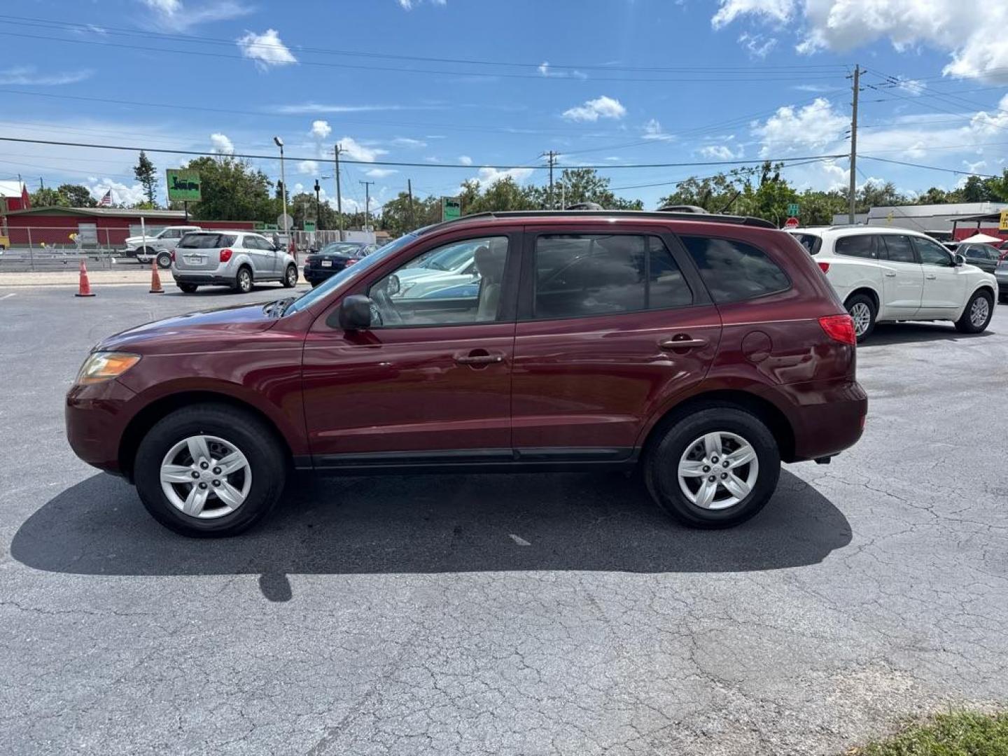 2009 RED HYUNDAI SANTA FE GLS (5NMSG13D39H) with an 2.7L engine, Automatic transmission, located at 2929 9th St. West, Bradenton, 34205, (941) 242-2810, 27.473591, -82.570679 - Thanks for inquring into DriveNation USA! All vehicles listed can be viewed at www.drivenationusa.com for vehicle history reports and additonal info. We cannot quote any terms such as down payments or monthly payments without an application. You can apply directly at www.drivenationusa.com or by con - Photo#5