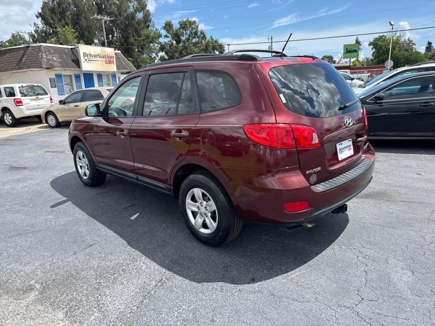 2009 RED HYUNDAI SANTA FE GLS (5NMSG13D39H) with an 2.7L engine, Automatic transmission, located at 2929 9th St. West, Bradenton, 34205, (941) 242-2810, 27.473591, -82.570679 - Thanks for inquring into DriveNation USA! All vehicles listed can be viewed at www.drivenationusa.com for vehicle history reports and additonal info. We cannot quote any terms such as down payments or monthly payments without an application. You can apply directly at www.drivenationusa.com or by con - Photo#6