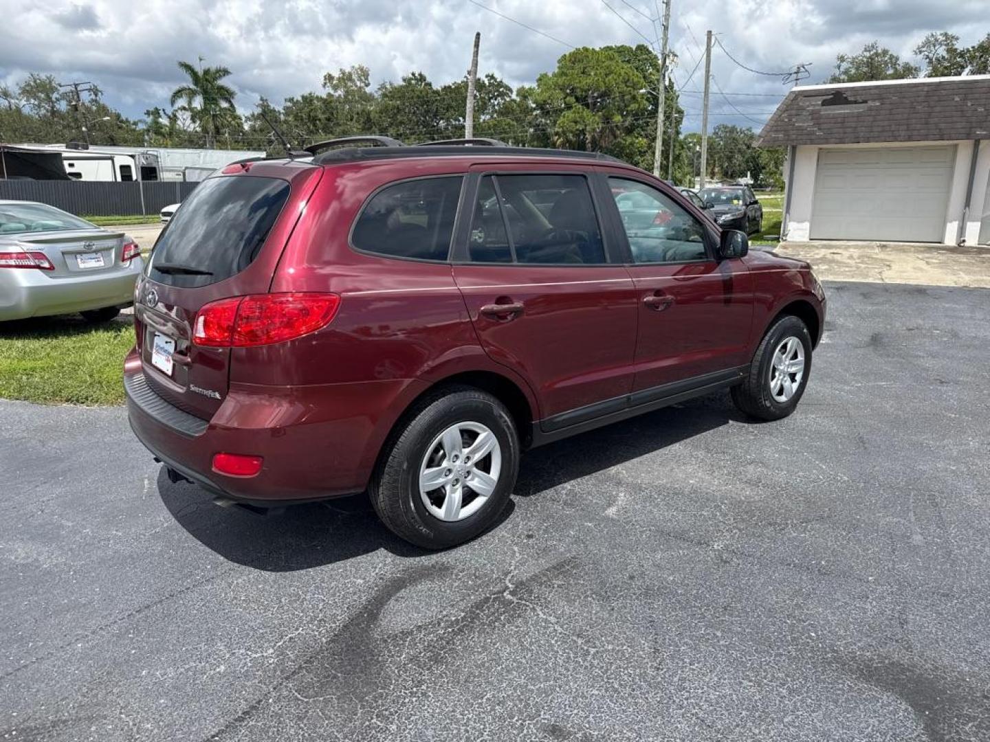 2009 RED HYUNDAI SANTA FE GLS (5NMSG13D39H) with an 2.7L engine, Automatic transmission, located at 2929 9th St. West, Bradenton, 34205, (941) 242-2810, 27.473591, -82.570679 - Thanks for inquring into DriveNation USA! All vehicles listed can be viewed at www.drivenationusa.com for vehicle history reports and additonal info. We cannot quote any terms such as down payments or monthly payments without an application. You can apply directly at www.drivenationusa.com or by con - Photo#8