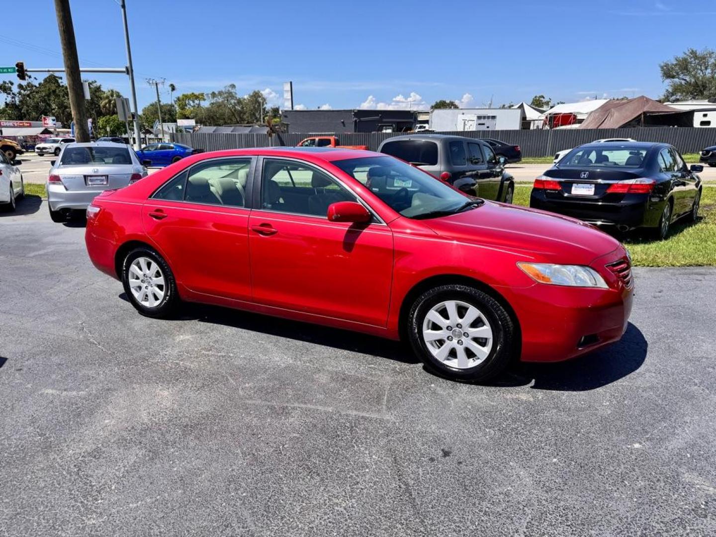 2009 RED TOYOTA CAMRY XLE (4T1BK46K99U) with an 3.5L engine, Automatic transmission, located at 2929 9th St. West, Bradenton, 34205, (941) 242-2810, 27.473591, -82.570679 - Thanks for inquring into DriveNation USA! All vehicles listed can be viewed at www.drivenationusa.com for vehicle history reports and additonal info. We cannot quote any terms such as down payments or monthly payments without an application. You can apply directly at www.drivenationusa.com or by con - Photo#1