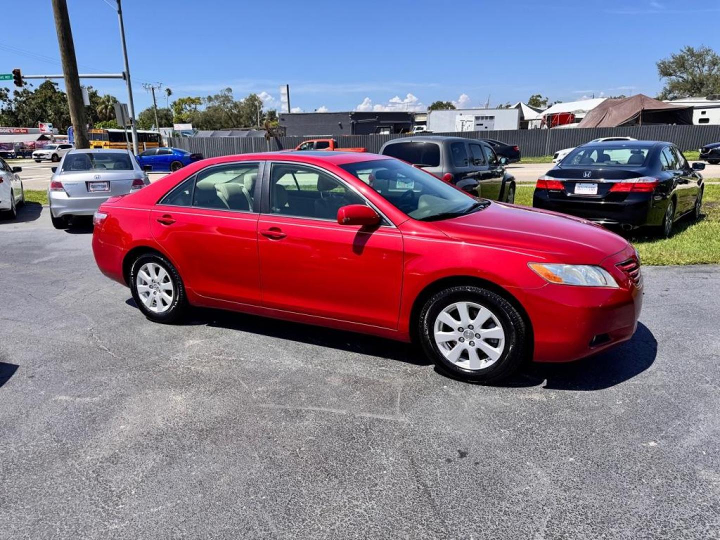 2009 RED TOYOTA CAMRY XLE (4T1BK46K99U) with an 3.5L engine, Automatic transmission, located at 2929 9th St. West, Bradenton, 34205, (941) 242-2810, 27.473591, -82.570679 - Thanks for inquring into DriveNation USA! All vehicles listed can be viewed at www.drivenationusa.com for vehicle history reports and additonal info. We cannot quote any terms such as down payments or monthly payments without an application. You can apply directly at www.drivenationusa.com or by con - Photo#2