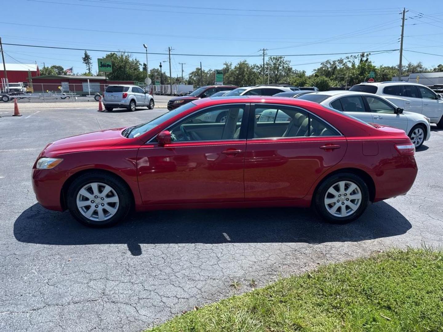 2009 RED TOYOTA CAMRY XLE (4T1BK46K99U) with an 3.5L engine, Automatic transmission, located at 2929 9th St. West, Bradenton, 34205, (941) 242-2810, 27.473591, -82.570679 - Thanks for inquring into DriveNation USA! All vehicles listed can be viewed at www.drivenationusa.com for vehicle history reports and additonal info. We cannot quote any terms such as down payments or monthly payments without an application. You can apply directly at www.drivenationusa.com or by con - Photo#5