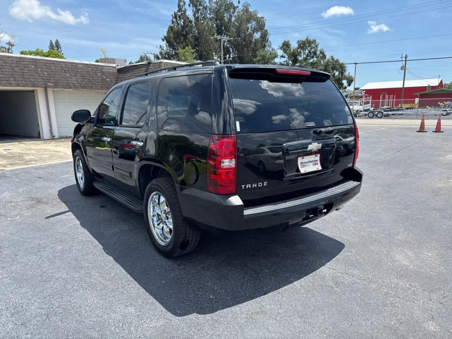 2008 BLACK CHEVROLET TAHOE 1500 LTZ (1GNFC13018R) with an 5.3L engine, Automatic transmission, located at 2929 9th St. West, Bradenton, 34205, (941) 242-2810, 27.473591, -82.570679 - Thanks for inquring into DriveNation USA! All vehicles listed can be viewed at www.drivenationusa.com for vehicle history reports and additonal info. We cannot quote any terms such as down payments or monthly payments without an application. You can apply directly at www.drivenationusa.com or by con - Photo#6