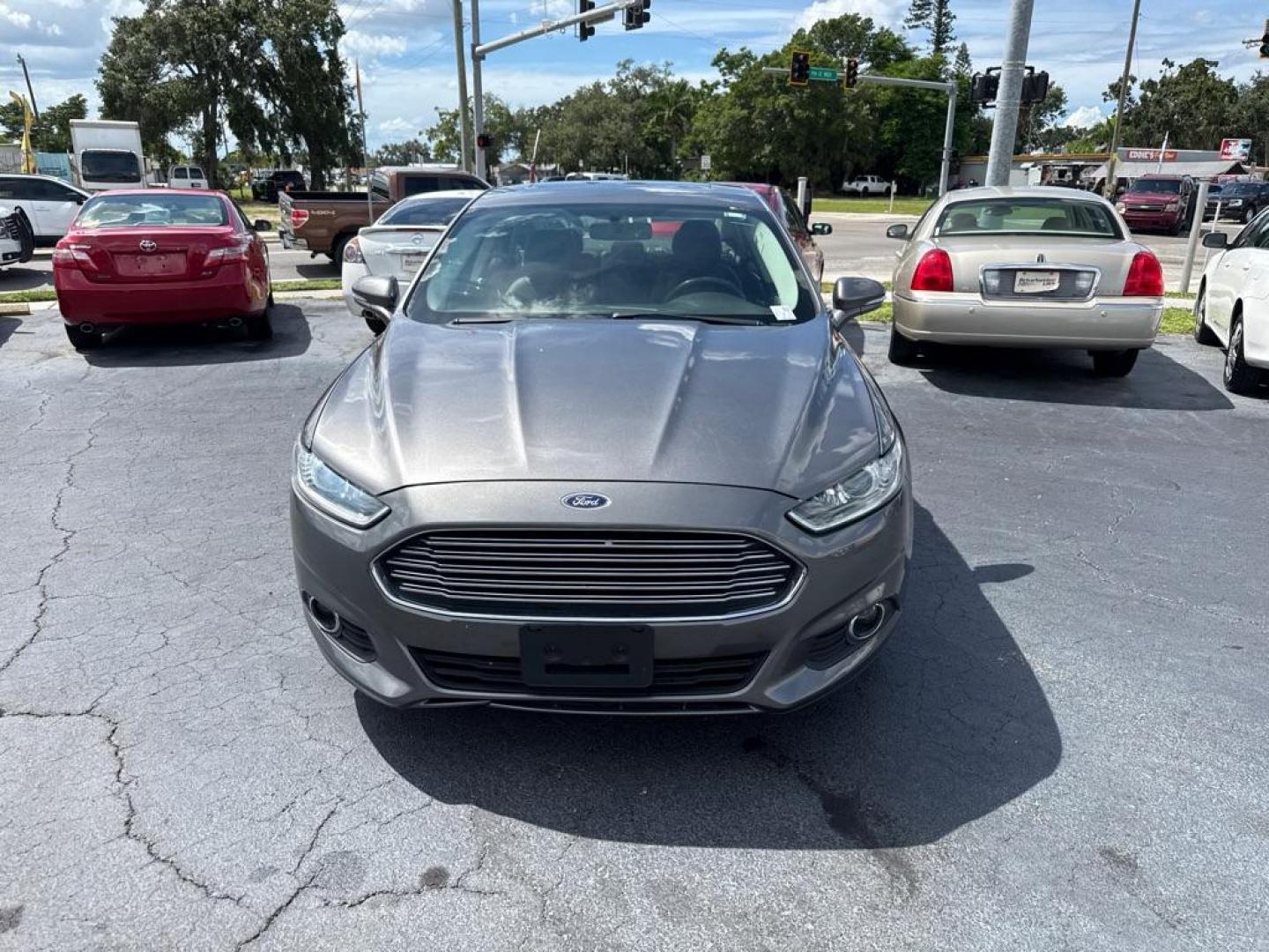 2014 GRAY FORD FUSION SE HYBRID (3FA6P0LU9ER) with an 2.0L engine, Continuously Variable transmission, located at 2929 9th St. West, Bradenton, 34205, (941) 242-2810, 27.473591, -82.570679 - Thanks for inquring into DriveNation USA! All vehicles listed can be viewed at www.drivenationusa.com for vehicle history reports and additonal info. We cannot quote any terms such as down payments or monthly payments without an application. You can apply directly at www.drivenationusa.com or by con - Photo#2