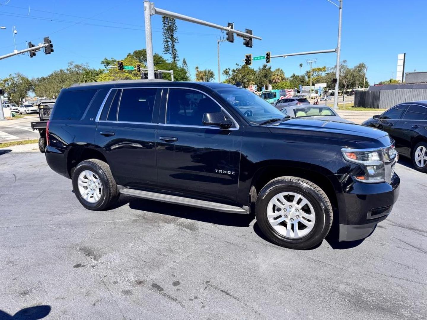 2016 BLACK CHEVROLET TAHOE 1500 LS (1GNSCAKC0GR) with an 5.3L engine, Automatic transmission, located at 2929 9th St. West, Bradenton, 34205, (941) 242-2810, 27.473591, -82.570679 - Photo#0
