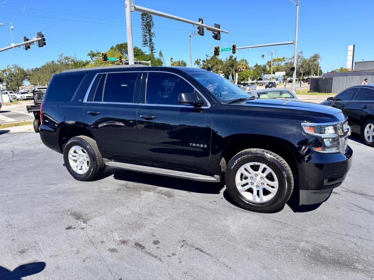 2016 BLACK CHEVROLET TAHOE 1500 LS (1GNSCAKC0GR) with an 5.3L engine, Automatic transmission, located at 2929 9th St. West, Bradenton, 34205, (941) 242-2810, 27.473591, -82.570679 - Photo#1
