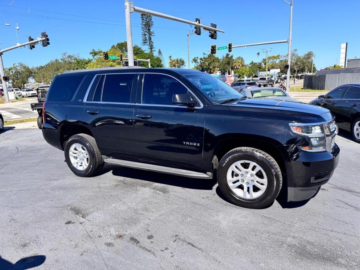 2016 BLACK CHEVROLET TAHOE 1500 LS (1GNSCAKC0GR) with an 5.3L engine, Automatic transmission, located at 2929 9th St. West, Bradenton, 34205, (941) 242-2810, 27.473591, -82.570679 - Photo#2