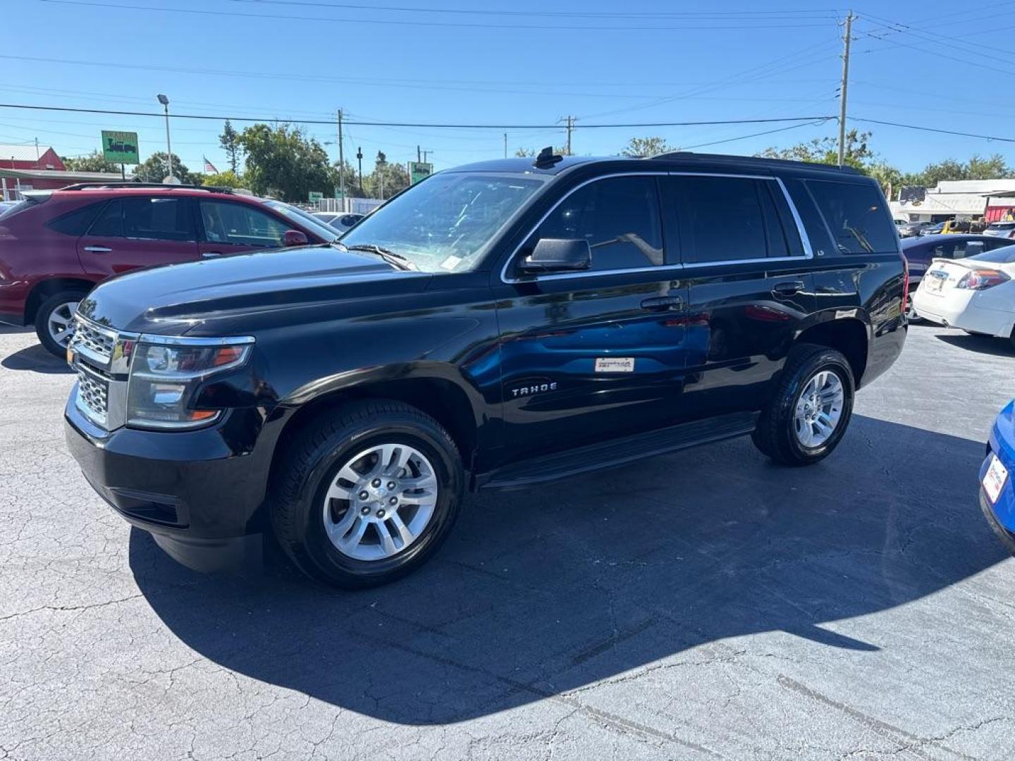 2016 BLACK CHEVROLET TAHOE 1500 LS (1GNSCAKC0GR) with an 5.3L engine, Automatic transmission, located at 2929 9th St. West, Bradenton, 34205, (941) 242-2810, 27.473591, -82.570679 - Photo#4
