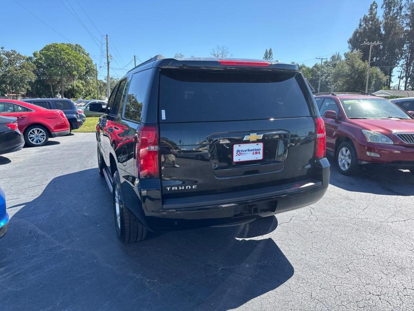 2016 BLACK CHEVROLET TAHOE 1500 LS (1GNSCAKC0GR) with an 5.3L engine, Automatic transmission, located at 2929 9th St. West, Bradenton, 34205, (941) 242-2810, 27.473591, -82.570679 - Photo#5