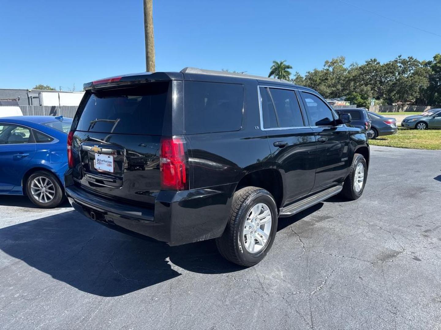 2016 BLACK CHEVROLET TAHOE 1500 LS (1GNSCAKC0GR) with an 5.3L engine, Automatic transmission, located at 2929 9th St. West, Bradenton, 34205, (941) 242-2810, 27.473591, -82.570679 - Photo#6