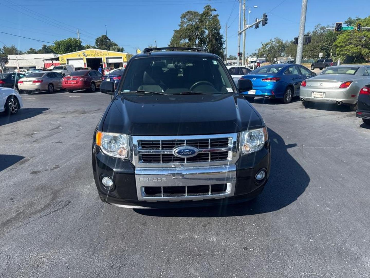 2012 BLACK FORD ESCAPE LIMITED (1FMCU0E72CK) with an 2.5L engine, Automatic transmission, located at 2929 9th St. West, Bradenton, 34205, (941) 242-2810, 27.473591, -82.570679 - Photo#3