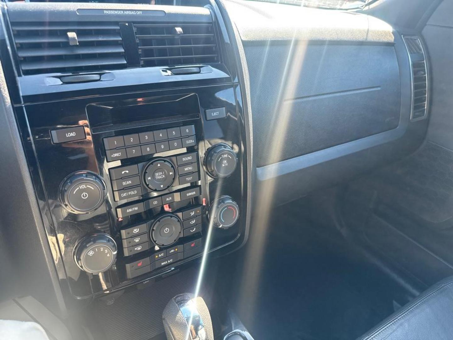 2012 BLACK FORD ESCAPE LIMITED (1FMCU0E72CK) with an 2.5L engine, Automatic transmission, located at 2929 9th St. West, Bradenton, 34205, (941) 242-2810, 27.473591, -82.570679 - Photo#13