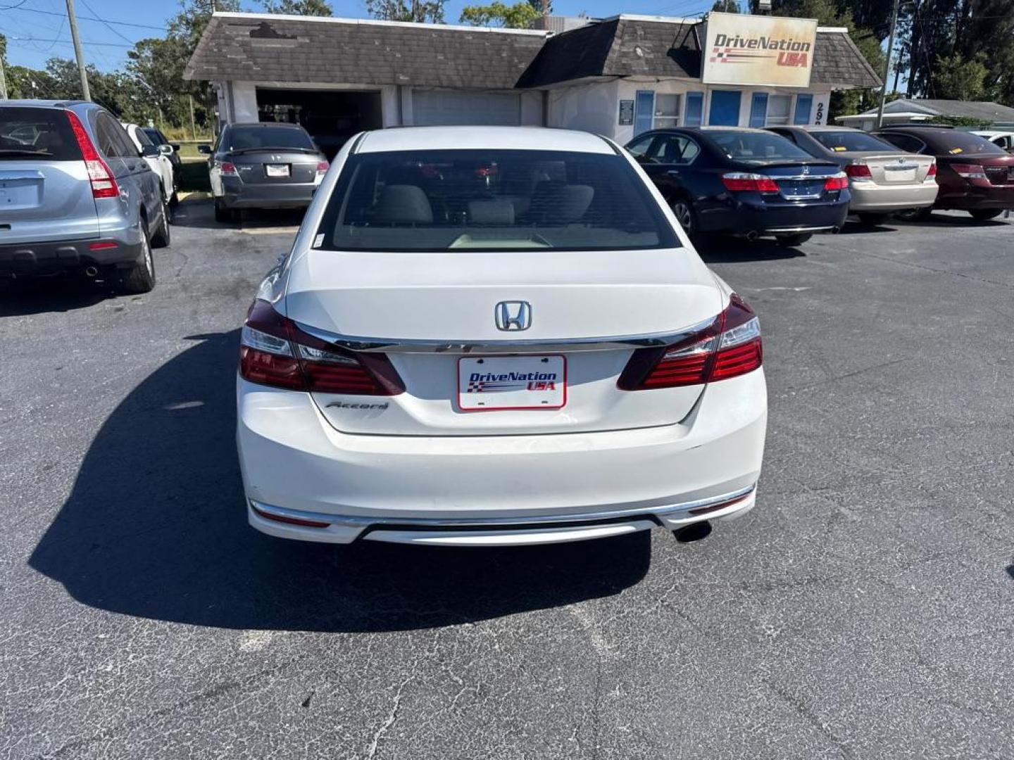 2016 WHITE HONDA ACCORD LX (1HGCR2F32GA) with an 2.4L engine, Continuously Variable transmission, located at 2929 9th St. West, Bradenton, 34205, (941) 242-2810, 27.473591, -82.570679 - Thanks for inquring into DriveNation USA! All vehicles listed can be viewed at www.drivenationusa.com for vehicle history reports and additonal info. We cannot quote any terms such as down payments or monthly payments without an application. You can apply directly at www.drivenationusa.com or by con - Photo#5