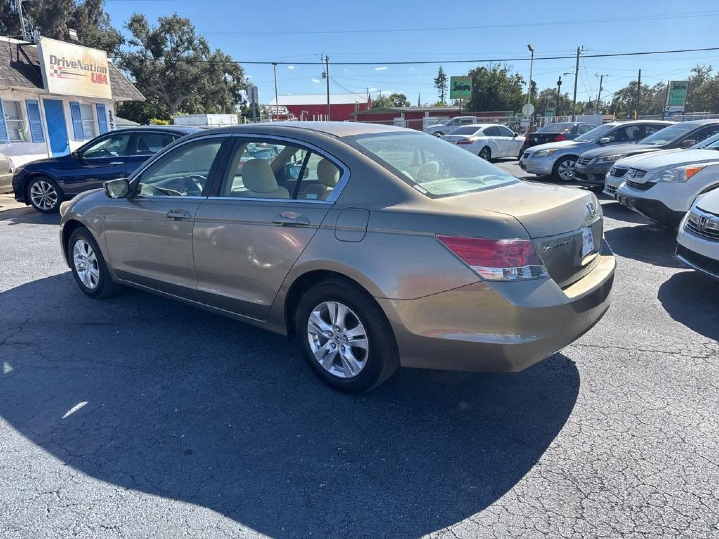 2009 TAN HONDA ACCORD LXP (1HGCP26479A) with an 2.4L engine, Automatic transmission, located at 2929 9th St. West, Bradenton, 34205, (941) 242-2810, 27.473591, -82.570679 - Thanks for inquring into DriveNation USA! All vehicles listed can be viewed at www.drivenationusa.com for vehicle history reports and additonal info. We cannot quote any terms such as down payments or monthly payments without an application. You can apply directly at www.drivenationusa.com or by con - Photo#5