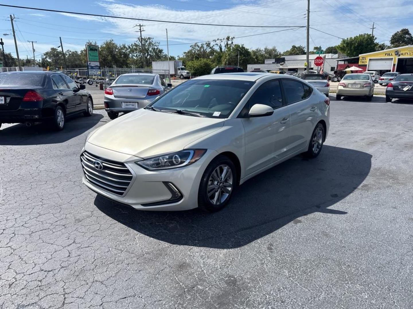 2018 TAN HYUNDAI ELANTRA SEL (KMHD84LF6JU) with an 2.0L engine, Automatic transmission, located at 2929 9th St. West, Bradenton, 34205, (941) 242-2810, 27.473591, -82.570679 - Thanks for inquring into DriveNation USA! All vehicles listed can be viewed at www.drivenationusa.com for vehicle history reports and additonal info. We cannot quote any terms such as down payments or monthly payments without an application. You can apply directly at www.drivenationusa.com or by con - Photo#4