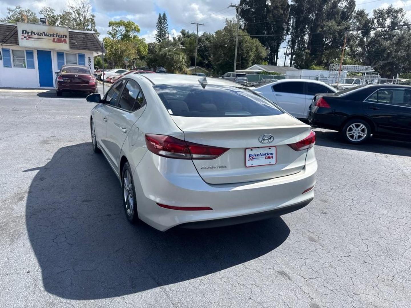 2018 TAN HYUNDAI ELANTRA SEL (KMHD84LF6JU) with an 2.0L engine, Automatic transmission, located at 2929 9th St. West, Bradenton, 34205, (941) 242-2810, 27.473591, -82.570679 - Thanks for inquring into DriveNation USA! All vehicles listed can be viewed at www.drivenationusa.com for vehicle history reports and additonal info. We cannot quote any terms such as down payments or monthly payments without an application. You can apply directly at www.drivenationusa.com or by con - Photo#6