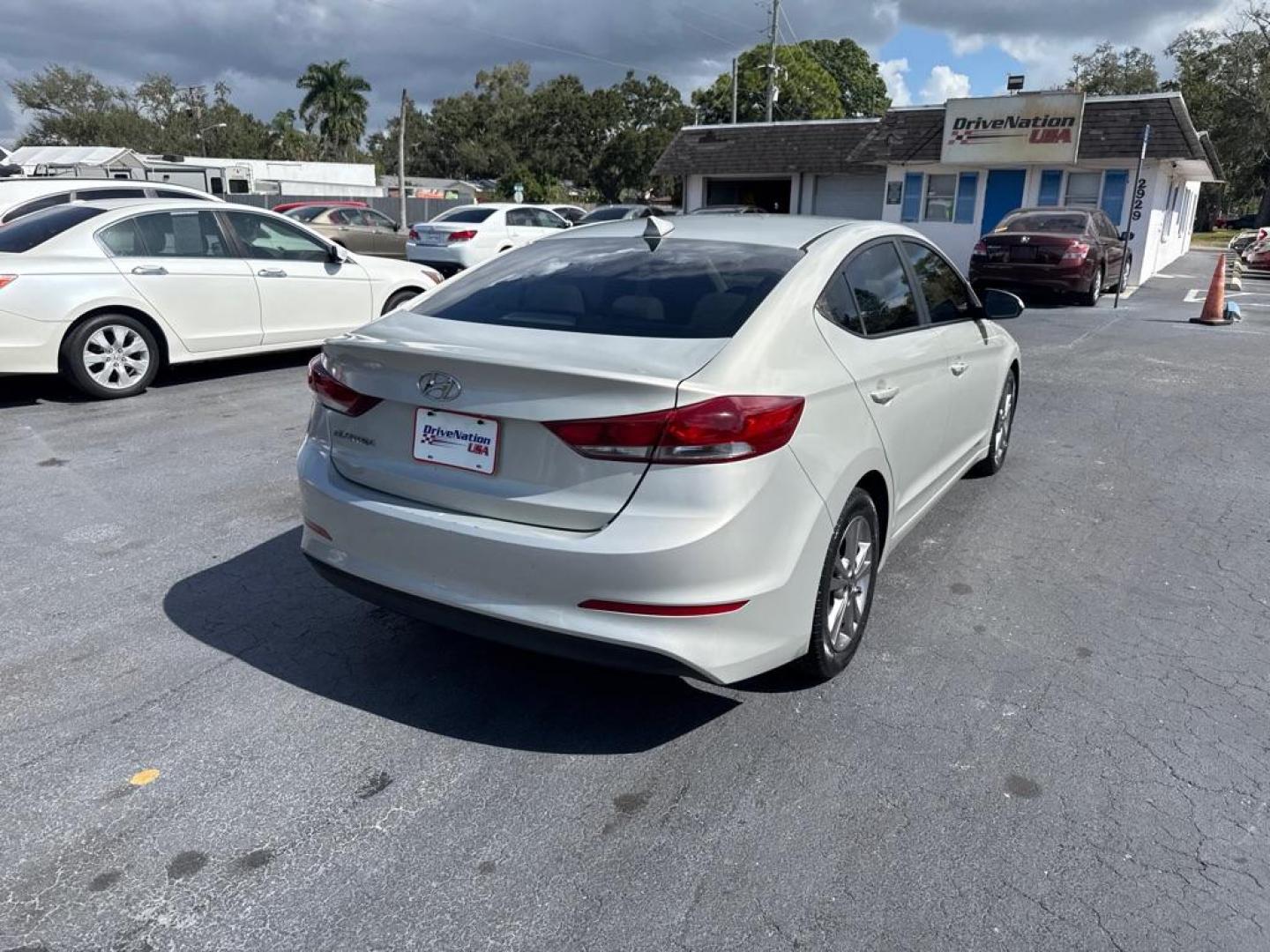 2018 TAN HYUNDAI ELANTRA SEL (KMHD84LF6JU) with an 2.0L engine, Automatic transmission, located at 2929 9th St. West, Bradenton, 34205, (941) 242-2810, 27.473591, -82.570679 - Thanks for inquring into DriveNation USA! All vehicles listed can be viewed at www.drivenationusa.com for vehicle history reports and additonal info. We cannot quote any terms such as down payments or monthly payments without an application. You can apply directly at www.drivenationusa.com or by con - Photo#8
