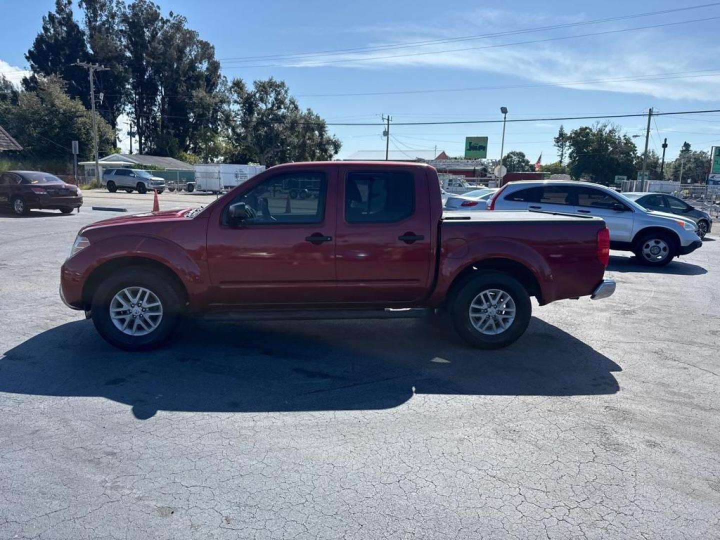 2015 RED NISSAN FRONTIER S (1N6AD0ER1FN) with an 4.0L engine, Automatic transmission, located at 2929 9th St. West, Bradenton, 34205, (941) 242-2810, 27.473591, -82.570679 - Thanks for inquring into DriveNation USA! All vehicles listed can be viewed at www.drivenationusa.com for vehicle history reports and additonal info. We cannot quote any terms such as down payments or monthly payments without an application. You can apply directly at www.drivenationusa.com or by con - Photo#4