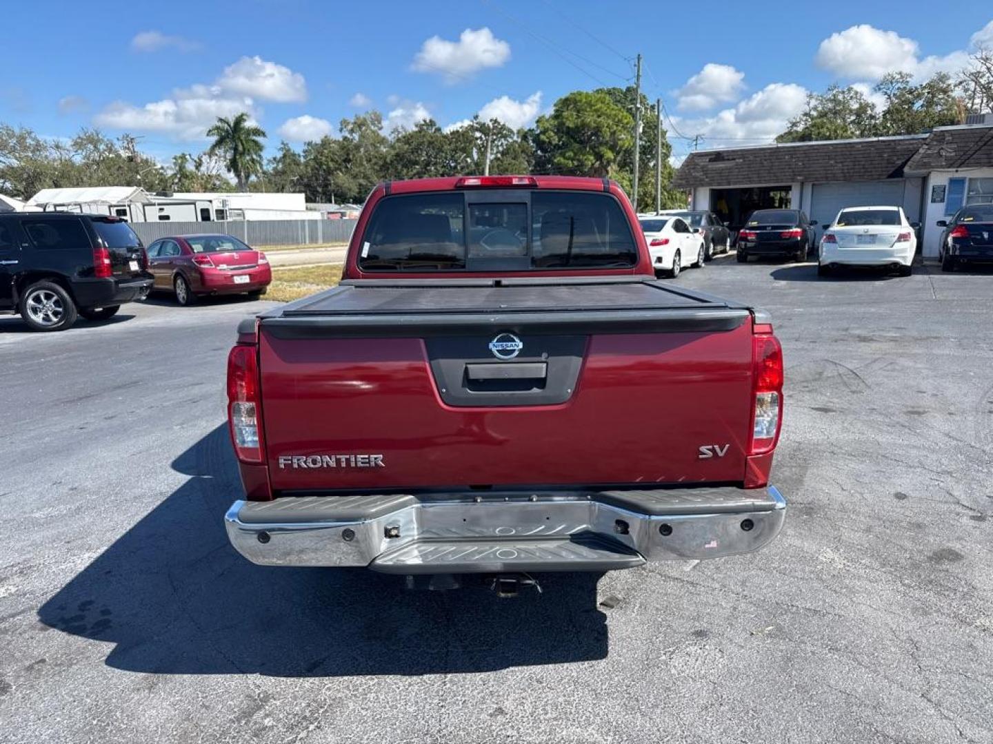 2015 RED NISSAN FRONTIER S (1N6AD0ER1FN) with an 4.0L engine, Automatic transmission, located at 2929 9th St. West, Bradenton, 34205, (941) 242-2810, 27.473591, -82.570679 - Thanks for inquring into DriveNation USA! All vehicles listed can be viewed at www.drivenationusa.com for vehicle history reports and additonal info. We cannot quote any terms such as down payments or monthly payments without an application. You can apply directly at www.drivenationusa.com or by con - Photo#6