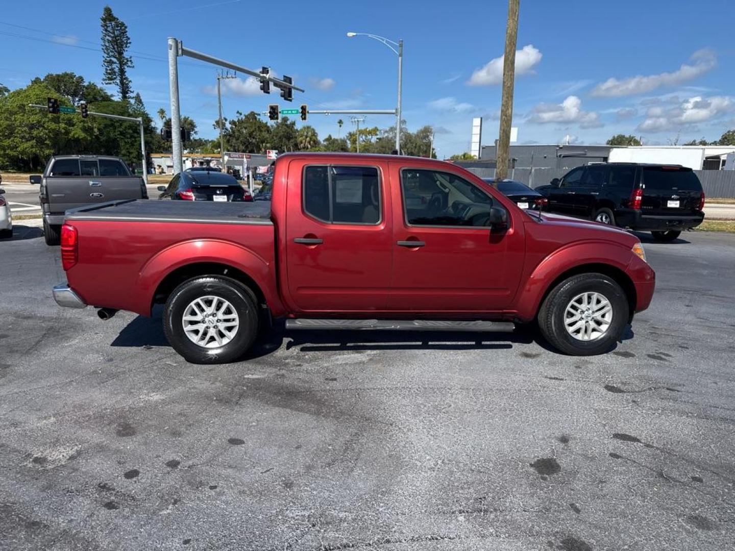 2015 RED NISSAN FRONTIER S (1N6AD0ER1FN) with an 4.0L engine, Automatic transmission, located at 2929 9th St. West, Bradenton, 34205, (941) 242-2810, 27.473591, -82.570679 - Thanks for inquring into DriveNation USA! All vehicles listed can be viewed at www.drivenationusa.com for vehicle history reports and additonal info. We cannot quote any terms such as down payments or monthly payments without an application. You can apply directly at www.drivenationusa.com or by con - Photo#8