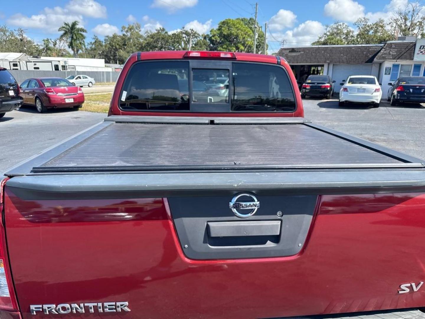 2015 RED NISSAN FRONTIER S (1N6AD0ER1FN) with an 4.0L engine, Automatic transmission, located at 2929 9th St. West, Bradenton, 34205, (941) 242-2810, 27.473591, -82.570679 - Thanks for inquring into DriveNation USA! All vehicles listed can be viewed at www.drivenationusa.com for vehicle history reports and additonal info. We cannot quote any terms such as down payments or monthly payments without an application. You can apply directly at www.drivenationusa.com or by con - Photo#9