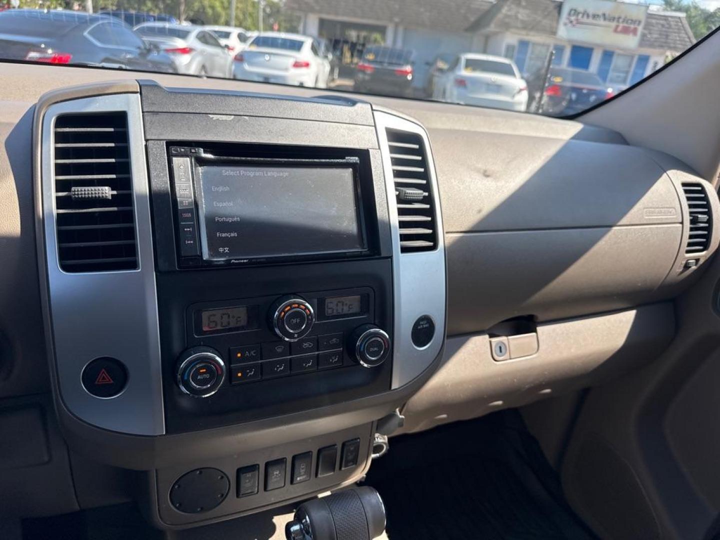 2015 RED NISSAN FRONTIER S (1N6AD0ER1FN) with an 4.0L engine, Automatic transmission, located at 2929 9th St. West, Bradenton, 34205, (941) 242-2810, 27.473591, -82.570679 - Thanks for inquring into DriveNation USA! All vehicles listed can be viewed at www.drivenationusa.com for vehicle history reports and additonal info. We cannot quote any terms such as down payments or monthly payments without an application. You can apply directly at www.drivenationusa.com or by con - Photo#11