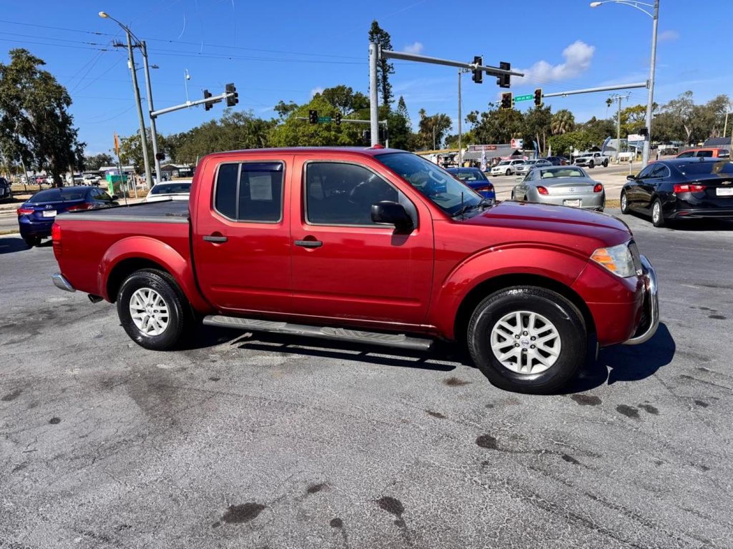 2015 RED NISSAN FRONTIER S (1N6AD0ER1FN) with an 4.0L engine, Automatic transmission, located at 2929 9th St. West, Bradenton, 34205, (941) 242-2810, 27.473591, -82.570679 - Thanks for inquring into DriveNation USA! All vehicles listed can be viewed at www.drivenationusa.com for vehicle history reports and additonal info. We cannot quote any terms such as down payments or monthly payments without an application. You can apply directly at www.drivenationusa.com or by con - Photo#13