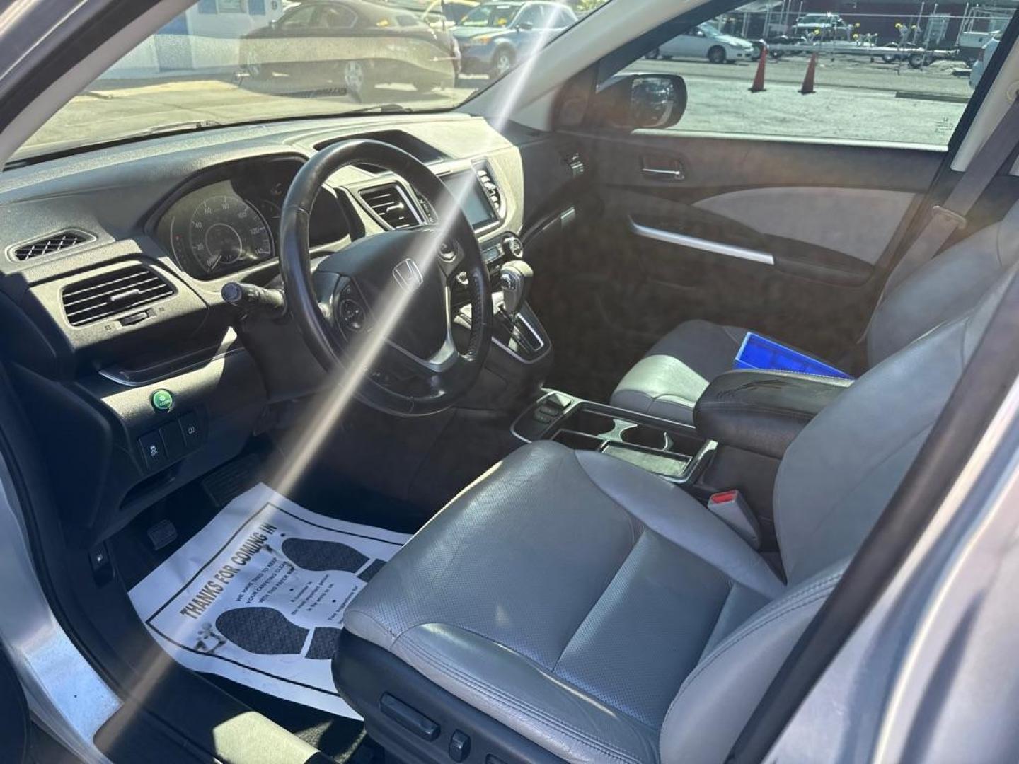 2015 SILVER HONDA CR-V EXL (2HKRM3H73FH) with an 2.4L engine, Continuously Variable transmission, located at 2929 9th St. West, Bradenton, 34205, (941) 242-2810, 27.473591, -82.570679 - Thanks for inquring into DriveNation USA! All vehicles listed can be viewed at www.drivenationusa.com for vehicle history reports and additonal info. We cannot quote any terms such as down payments or monthly payments without an application. You can apply directly at www.drivenationusa.com or by con - Photo#8