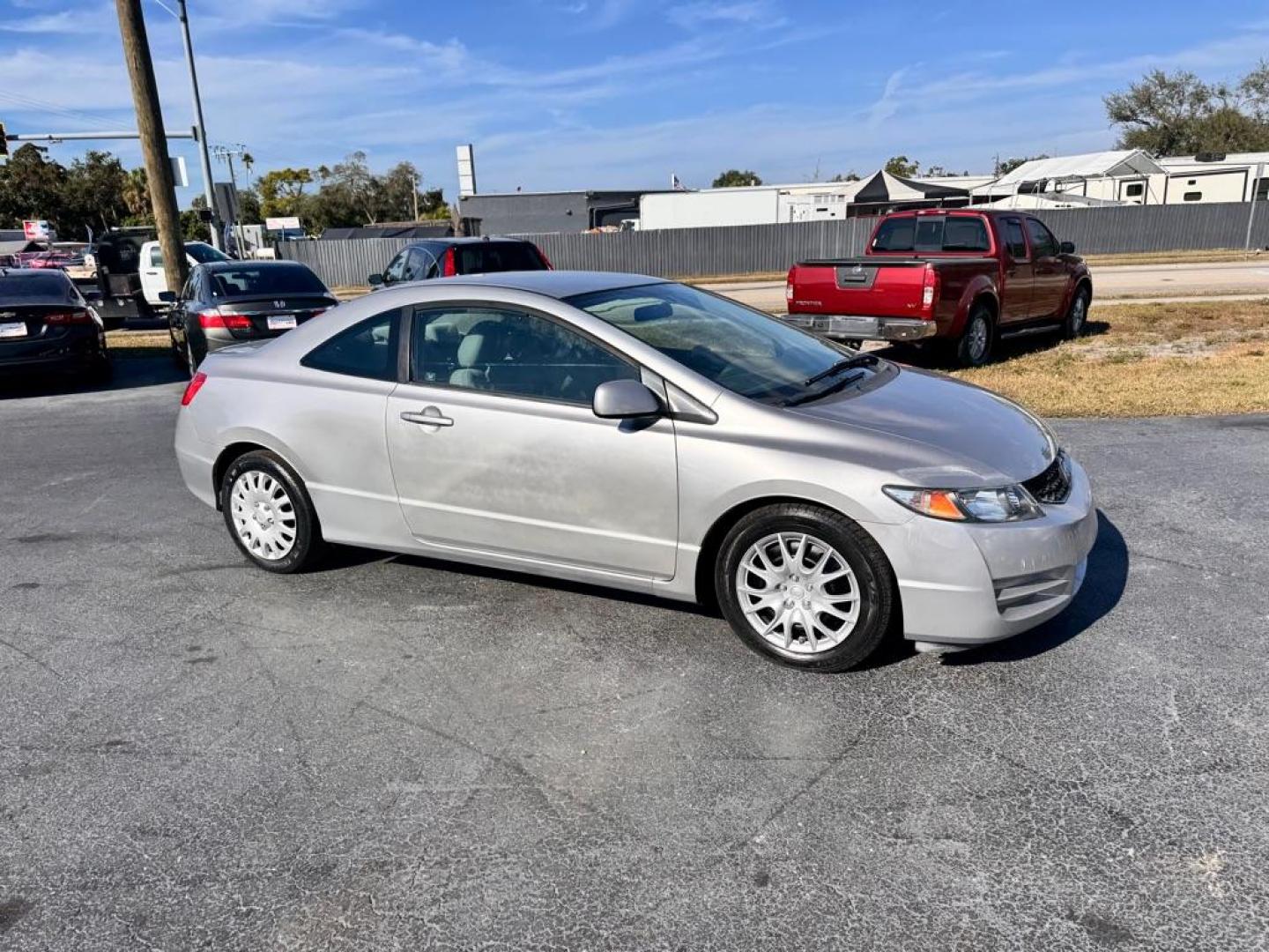 2010 SILVER HONDA CIVIC LX (2HGFG1B63AH) with an 1.8L engine, Automatic transmission, located at 2929 9th St. West, Bradenton, 34205, (941) 242-2810, 27.473591, -82.570679 - Photo#0