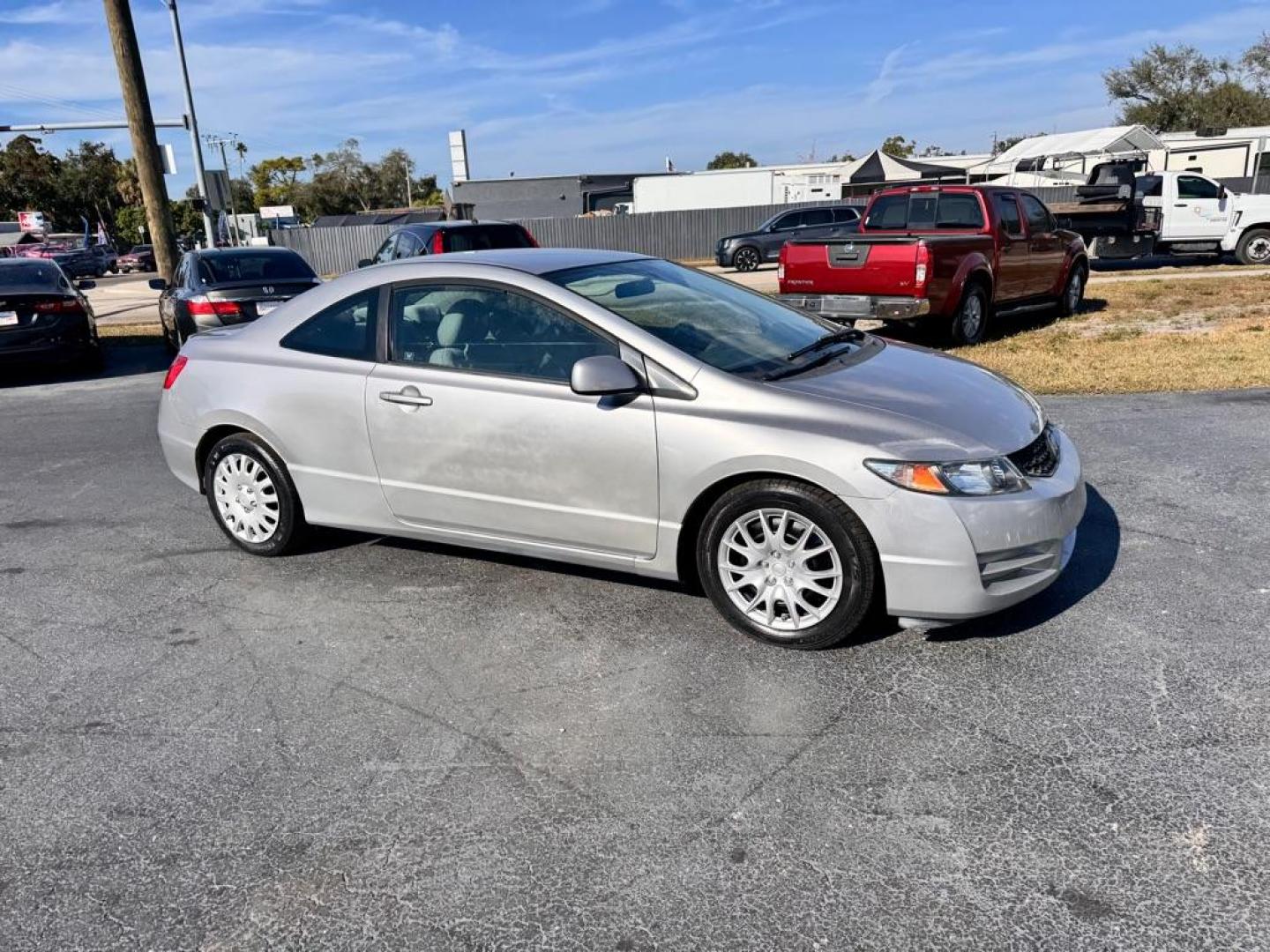 2010 SILVER HONDA CIVIC LX (2HGFG1B63AH) with an 1.8L engine, Automatic transmission, located at 2929 9th St. West, Bradenton, 34205, (941) 242-2810, 27.473591, -82.570679 - Photo#1