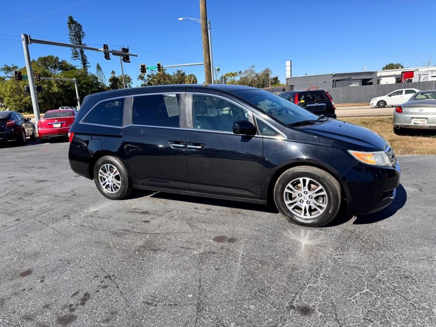 2011 BLACK HONDA ODYSSEY EX (5FNRL5H49BB) with an 3.5L engine, Automatic transmission, located at 2929 9th St. West, Bradenton, 34205, (941) 242-2810, 27.473591, -82.570679 - Photo#1