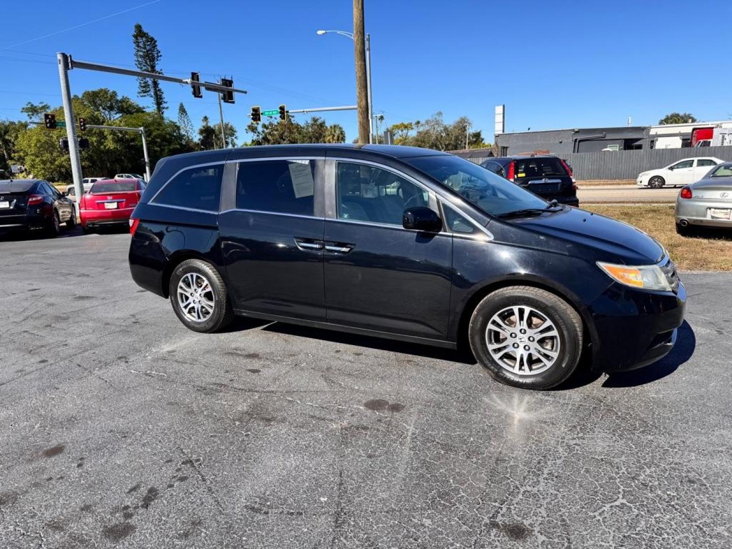 2011 BLACK HONDA ODYSSEY EX (5FNRL5H49BB) with an 3.5L engine, Automatic transmission, located at 2929 9th St. West, Bradenton, 34205, (941) 242-2810, 27.473591, -82.570679 - Photo#2