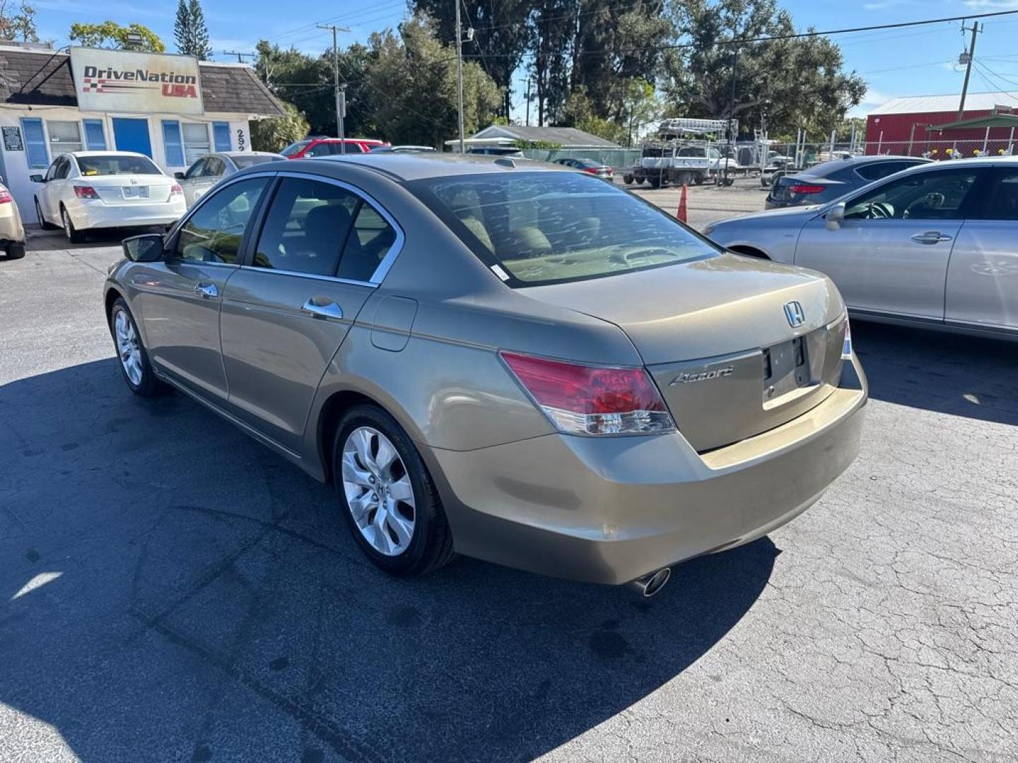 2009 GOLD HONDA ACCORD EXL (5KBCP36859B) with an 3.5L engine, Automatic transmission, located at 2929 9th St. West, Bradenton, 34205, (941) 242-2810, 27.473591, -82.570679 - Thanks for inquring into DriveNation USA! All vehicles listed can be viewed at www.drivenationusa.com for vehicle history reports and additonal info. We cannot quote any terms such as down payments or monthly payments without an application. You can apply directly at www.drivenationusa.com or by con - Photo#5
