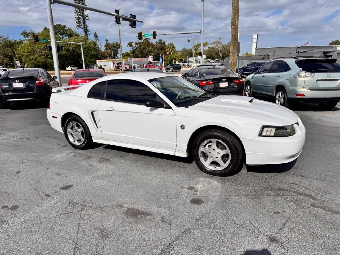 2004 WHITE FORD MUSTANG (1FAFP40434F) with an 3.8L engine, Automatic transmission, located at 2929 9th St. West, Bradenton, 34205, (941) 242-2810, 27.473591, -82.570679 - Thanks for inquring into DriveNation USA! All vehicles listed can be viewed at www.drivenationusa.com for vehicle history reports and additonal info. We cannot quote any terms such as down payments or monthly payments without an application. You can apply directly at www.drivenationusa.com or by con - Photo#0