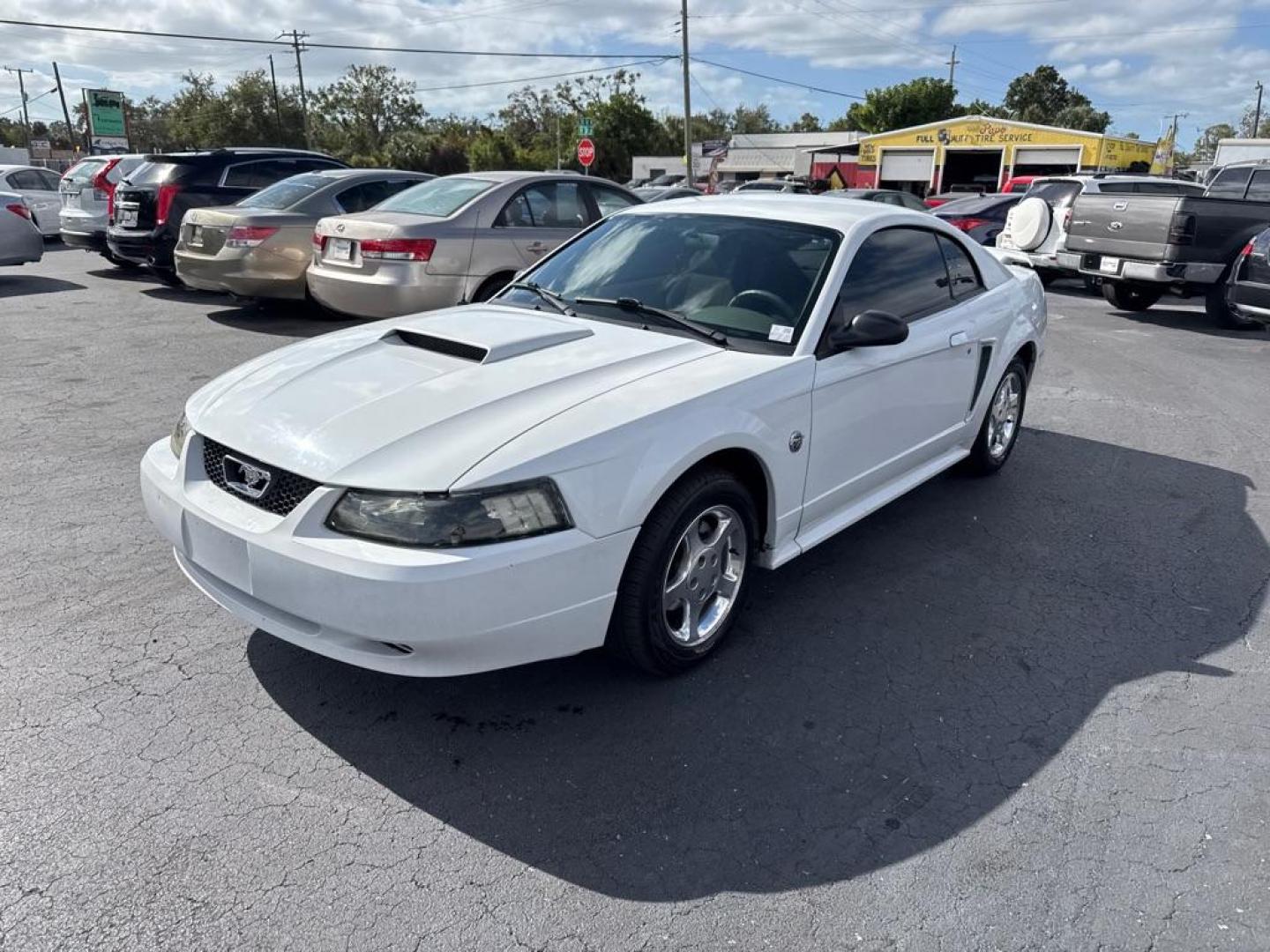 2004 WHITE FORD MUSTANG (1FAFP40434F) with an 3.8L engine, Automatic transmission, located at 2929 9th St. West, Bradenton, 34205, (941) 242-2810, 27.473591, -82.570679 - Thanks for inquring into DriveNation USA! All vehicles listed can be viewed at www.drivenationusa.com for vehicle history reports and additonal info. We cannot quote any terms such as down payments or monthly payments without an application. You can apply directly at www.drivenationusa.com or by con - Photo#3