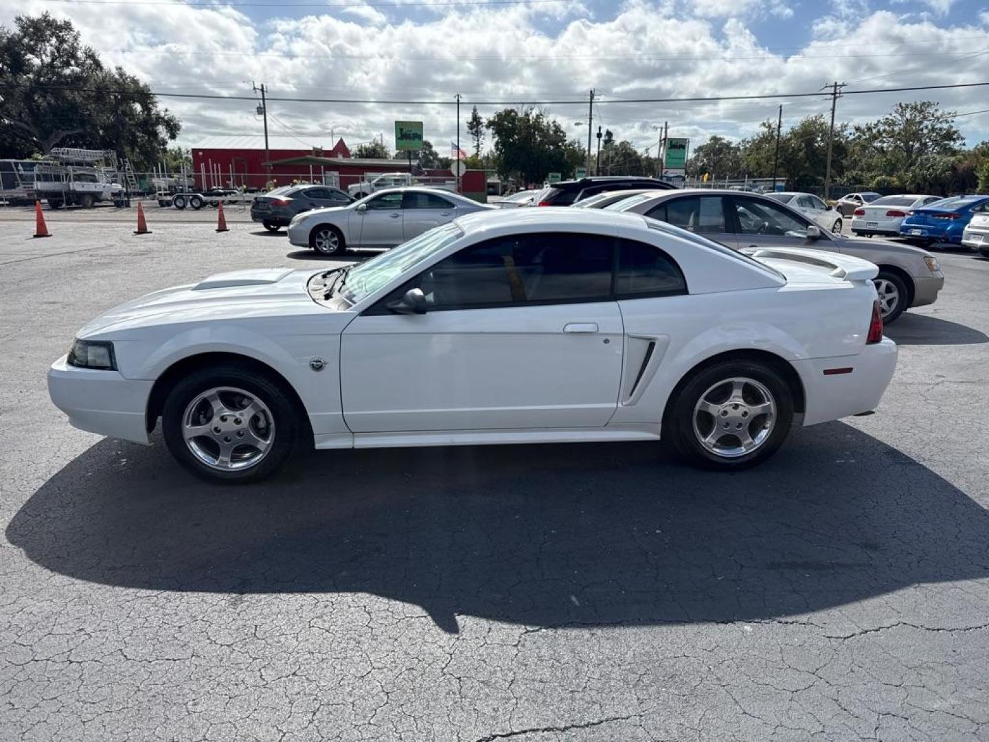 2004 WHITE FORD MUSTANG (1FAFP40434F) with an 3.8L engine, Automatic transmission, located at 2929 9th St. West, Bradenton, 34205, (941) 242-2810, 27.473591, -82.570679 - Thanks for inquring into DriveNation USA! All vehicles listed can be viewed at www.drivenationusa.com for vehicle history reports and additonal info. We cannot quote any terms such as down payments or monthly payments without an application. You can apply directly at www.drivenationusa.com or by con - Photo#4