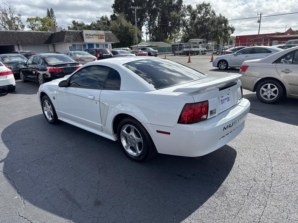 2004 WHITE FORD MUSTANG (1FAFP40434F) with an 3.8L engine, Automatic transmission, located at 2929 9th St. West, Bradenton, 34205, (941) 242-2810, 27.473591, -82.570679 - Thanks for inquring into DriveNation USA! All vehicles listed can be viewed at www.drivenationusa.com for vehicle history reports and additonal info. We cannot quote any terms such as down payments or monthly payments without an application. You can apply directly at www.drivenationusa.com or by con - Photo#5