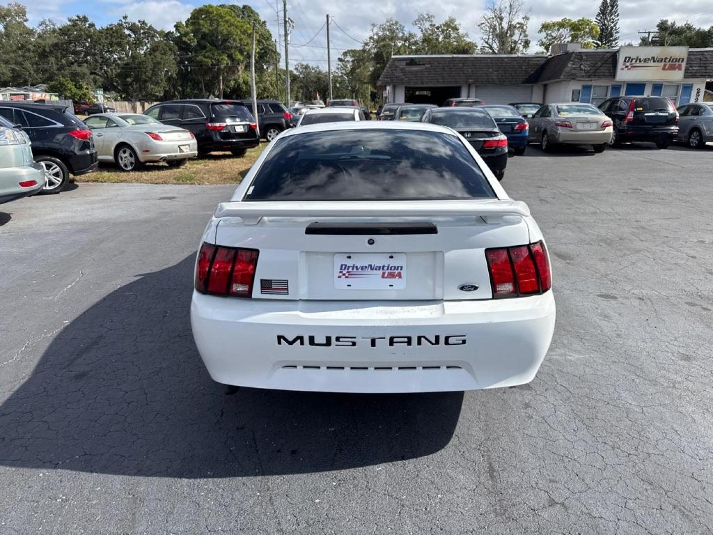 2004 WHITE FORD MUSTANG (1FAFP40434F) with an 3.8L engine, Automatic transmission, located at 2929 9th St. West, Bradenton, 34205, (941) 242-2810, 27.473591, -82.570679 - Thanks for inquring into DriveNation USA! All vehicles listed can be viewed at www.drivenationusa.com for vehicle history reports and additonal info. We cannot quote any terms such as down payments or monthly payments without an application. You can apply directly at www.drivenationusa.com or by con - Photo#6