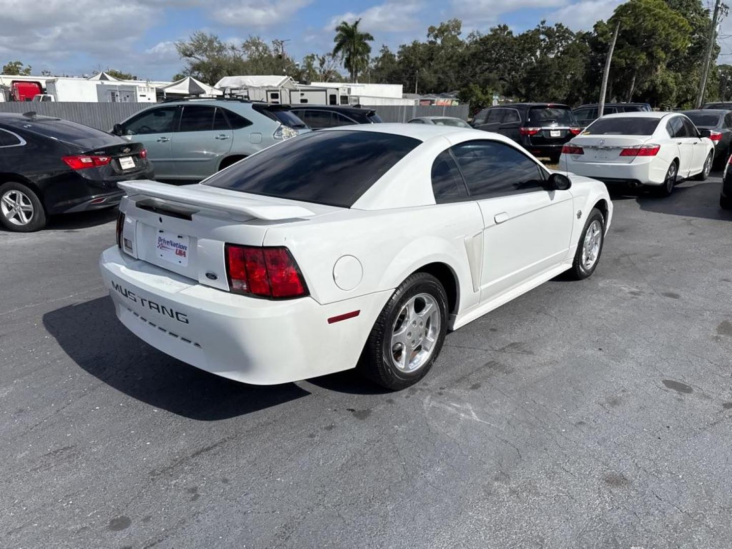 2004 WHITE FORD MUSTANG (1FAFP40434F) with an 3.8L engine, Automatic transmission, located at 2929 9th St. West, Bradenton, 34205, (941) 242-2810, 27.473591, -82.570679 - Thanks for inquring into DriveNation USA! All vehicles listed can be viewed at www.drivenationusa.com for vehicle history reports and additonal info. We cannot quote any terms such as down payments or monthly payments without an application. You can apply directly at www.drivenationusa.com or by con - Photo#7