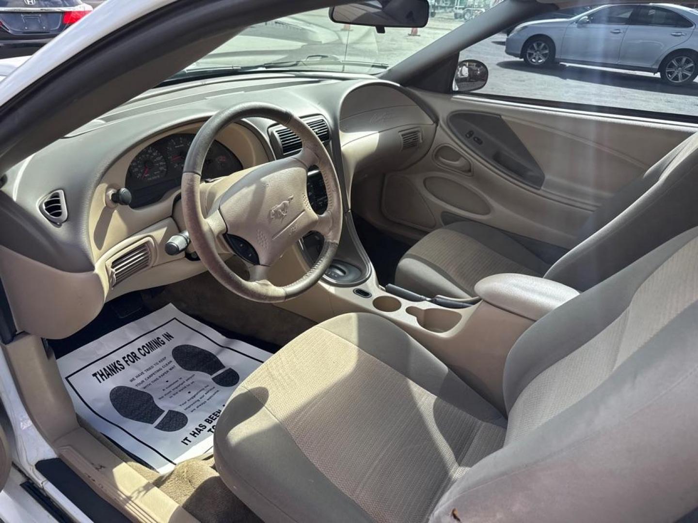 2004 WHITE FORD MUSTANG (1FAFP40434F) with an 3.8L engine, Automatic transmission, located at 2929 9th St. West, Bradenton, 34205, (941) 242-2810, 27.473591, -82.570679 - Thanks for inquring into DriveNation USA! All vehicles listed can be viewed at www.drivenationusa.com for vehicle history reports and additonal info. We cannot quote any terms such as down payments or monthly payments without an application. You can apply directly at www.drivenationusa.com or by con - Photo#10