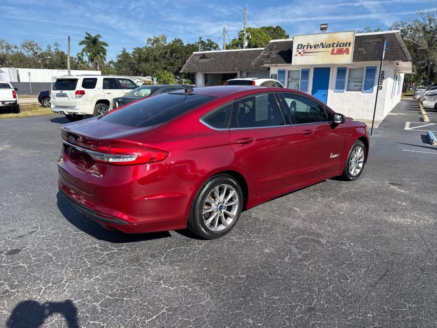 2017 RED FORD FUSION SE HYBRID (3FA6P0LU7HR) with an 2.0L engine, Continuously Variable transmission, located at 2929 9th St. West, Bradenton, 34205, (941) 242-2810, 27.473591, -82.570679 - Thanks for inquring into DriveNation USA! All vehicles listed can be viewed at www.drivenationusa.com for vehicle history reports and additonal info. We cannot quote any terms such as down payments or monthly payments without an application. You can apply directly at www.drivenationusa.com or by con - Photo#8