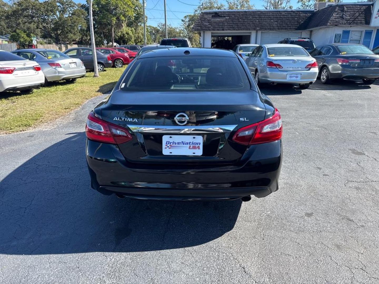 2018 BLACK NISSAN ALTIMA 2.5 SL (1N4AL3AP2JC) with an 2.5L engine, Continuously Variable transmission, located at 2929 9th St. West, Bradenton, 34205, (941) 242-2810, 27.473591, -82.570679 - Thanks for inquring into DriveNation USA! All vehicles listed can be viewed at www.drivenationusa.com for vehicle history reports and additonal info. We cannot quote any terms such as down payments or monthly payments without an application. You can apply directly at www.drivenationusa.com or by con - Photo#6