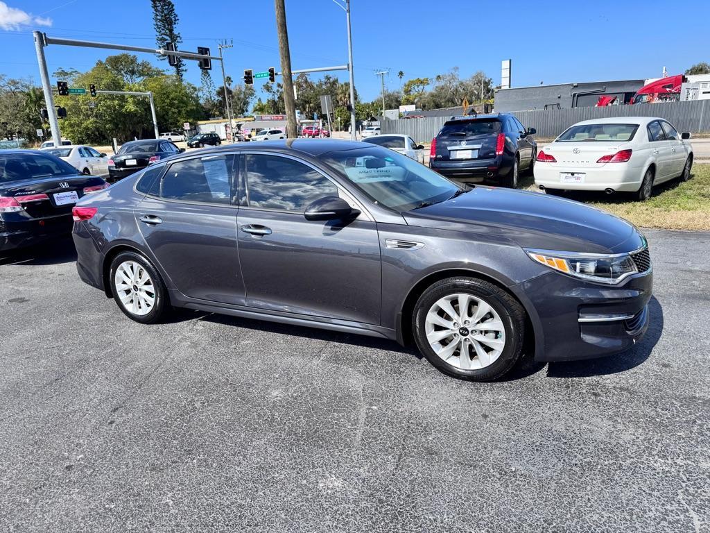 2018 BLACK KIA OPTIMA EX (5XXGU4L3XJG) with an 2.4L engine, Automatic transmission, located at 2929 9th St. West, Bradenton, 34205, (941) 242-2810, 27.473591, -82.570679 - Thanks for inquring into DriveNation USA! All vehicles listed can be viewed at www.drivenationusa.com for vehicle history reports and additonal info. We cannot quote any terms such as down payments or monthly payments without an application. You can apply directly at www.drivenationusa.com or by con - Photo#1