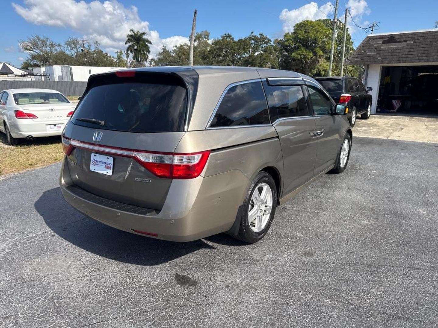 2012 TAN HONDA ODYSSEY TOURING (5FNRL5H97CB) with an 3.5L engine, Automatic transmission, located at 2929 9th St. West, Bradenton, 34205, (941) 242-2810, 27.473591, -82.570679 - Photo#7