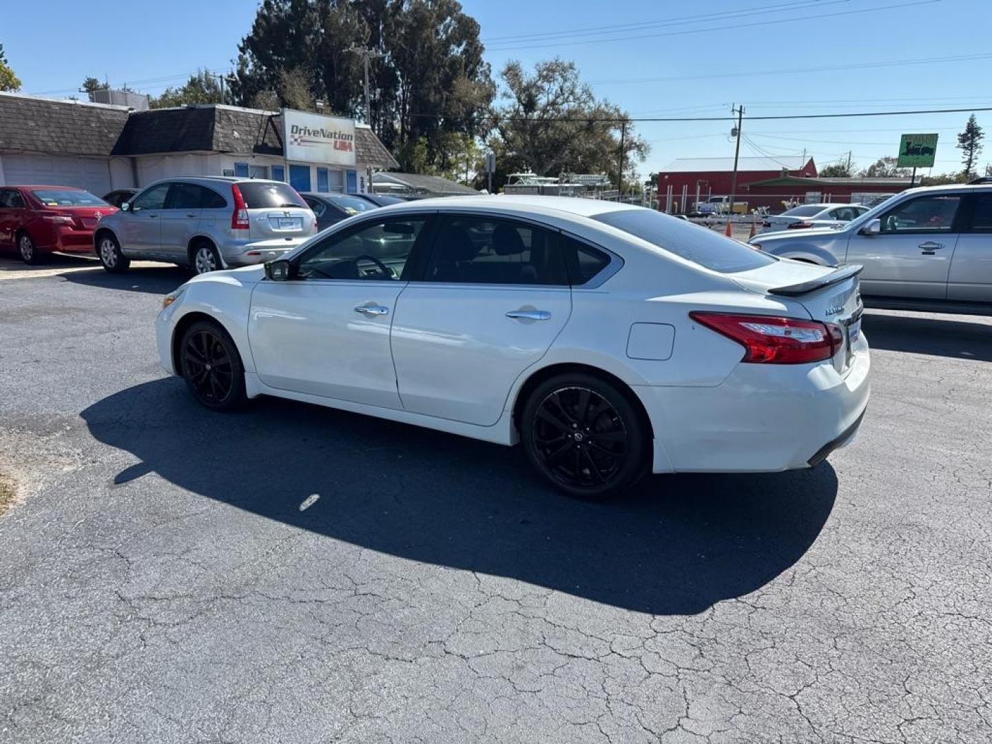 2017 WHITE NISSAN ALTIMA 2.5 SV (1N4AL3AP7HC) with an 2.5L engine, Continuously Variable transmission, located at 2929 9th St. West, Bradenton, 34205, (941) 242-2810, 27.473591, -82.570679 - Thanks for inquring into DriveNation USA! All vehicles listed can be viewed at www.drivenationusa.com for vehicle history reports and additonal info. We cannot quote any terms such as down payments or monthly payments without an application. You can apply directly at www.drivenationusa.com or by con - Photo#4