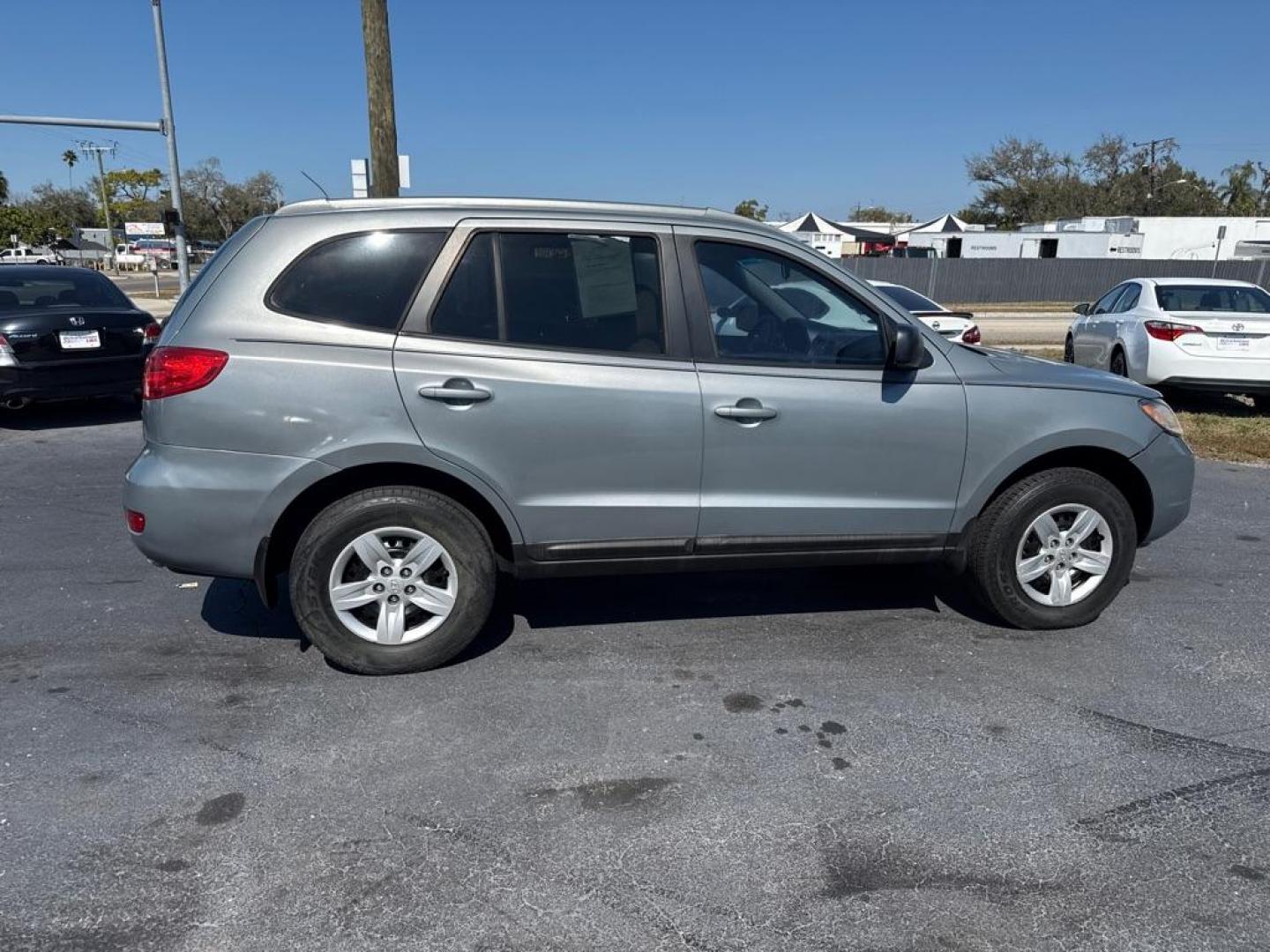 2009 BLUE HYUNDAI SANTA FE GLS (5NMSG13D39H) with an 2.7L engine, Automatic transmission, located at 2929 9th St. West, Bradenton, 34205, (941) 242-2810, 27.473591, -82.570679 - Thanks for inquring into DriveNation USA! All vehicles listed can be viewed at www.drivenationusa.com for vehicle history reports and additonal info. We cannot quote any terms such as down payments or monthly payments without an application. You can apply directly at www.drivenationusa.com or by con - Photo#8